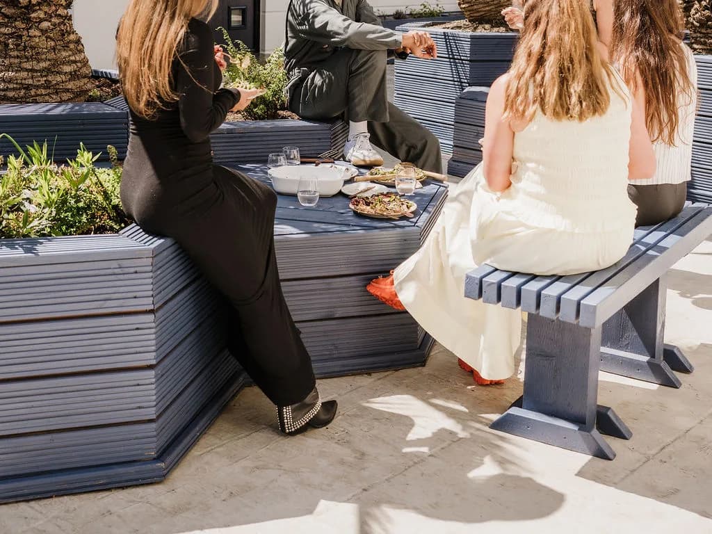 The palm-lined courtyard at AndSoul The Villas, Shoreditch